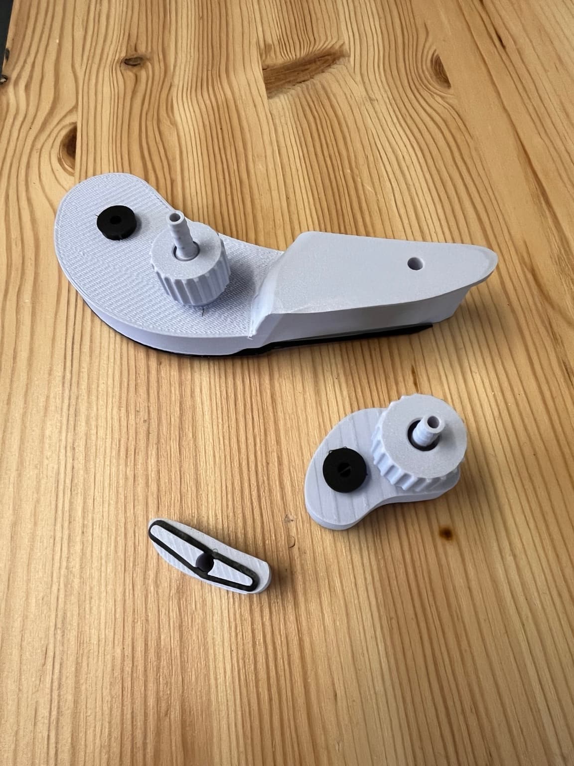 Pièce imprimée en 3D par Qualiroad, montée et testée en atelier comme solution rapide.